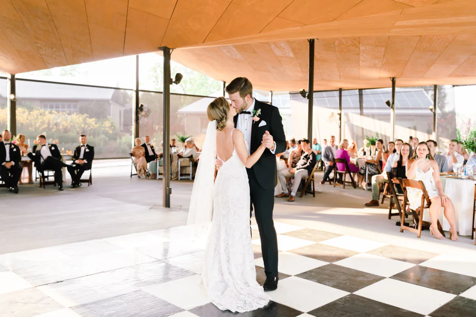 Bride and groom sharing their first dance at Yew Dell Botanical Gardens
